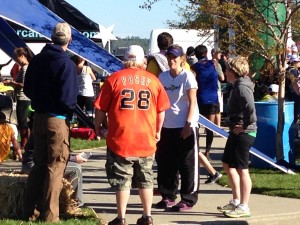 Pigeon, Missouri, TiggerT and I retelling trail stories (wearing my Dylan shirt post race).