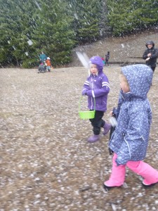 The girls had an easter egg hunt in a snow storm. 