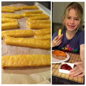 Squeaker trying (and liking) my baked polenta fries.