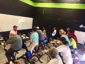 Indoor cycling workout led by Sally the Head Heart